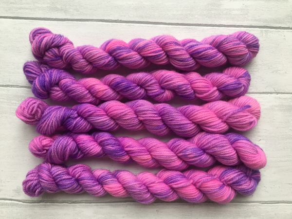 Green Yarn with Black and Purple Patches